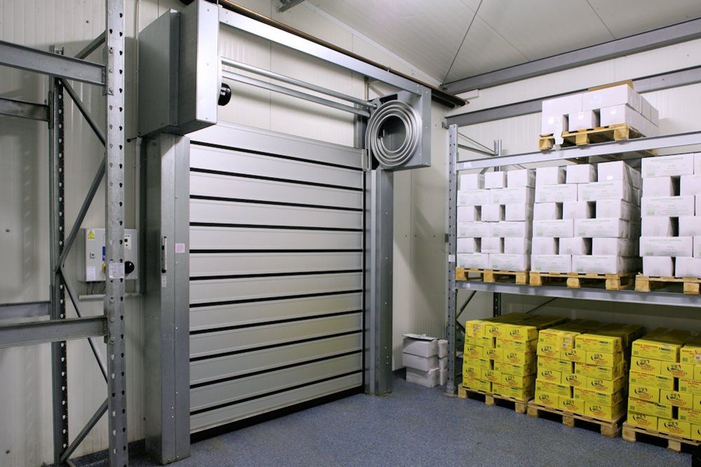 Keep it cool met een EFAFLEX snelloopdeur Keep it cool met een EFAFLEX snelloopdeur