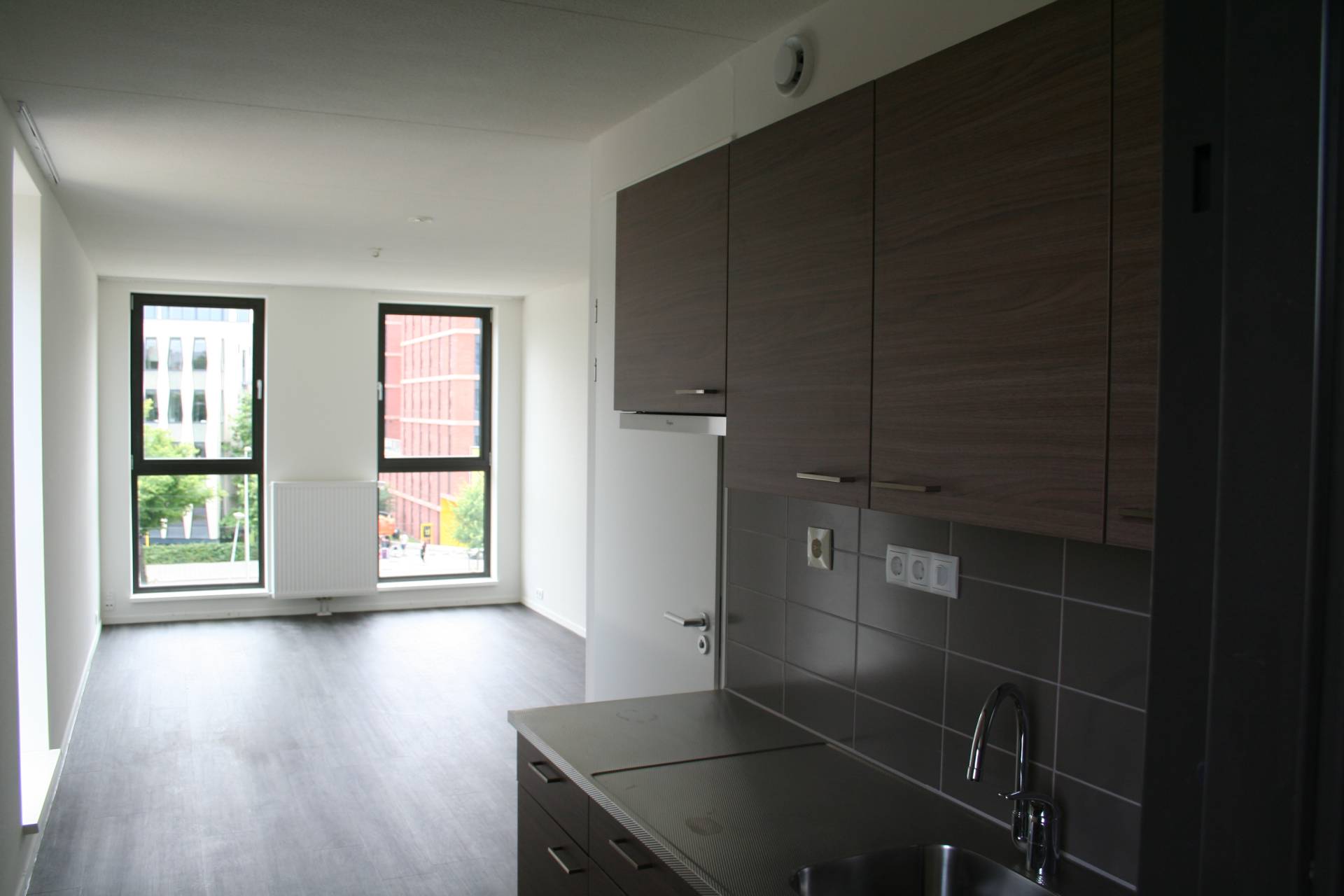 Bijzondere kozijn-raamcombinatie voor studentenwoningen Laan van Spartaan