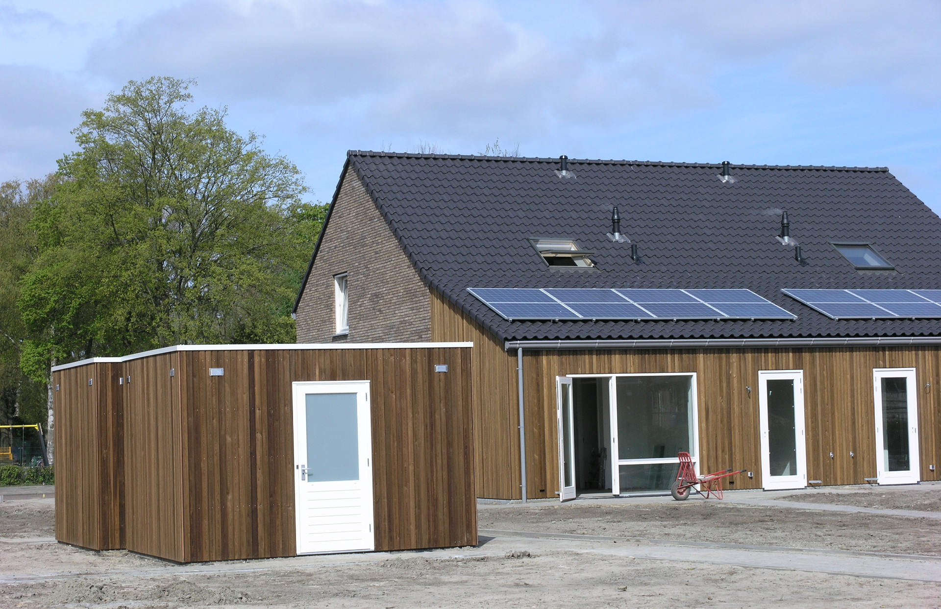 houten bergingen bij woningen 