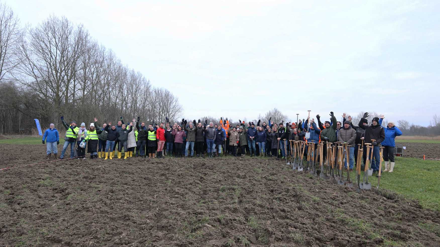 Groepsfoto in een weiland
