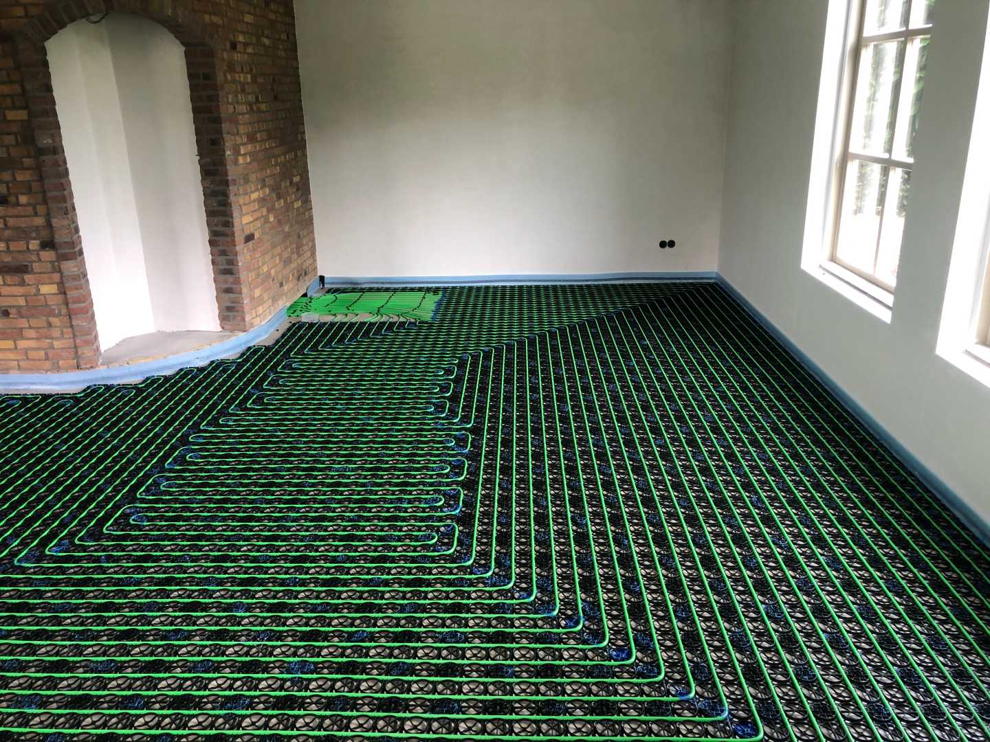 Vloerverarming in een woonhuis