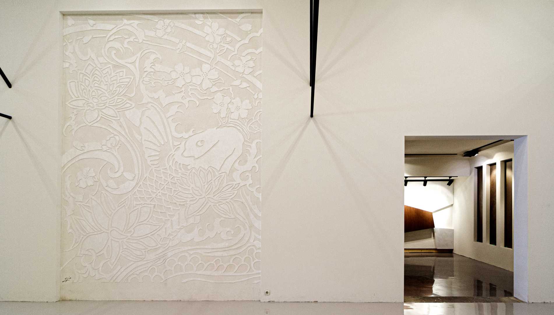 Wand met akoestisch pleister