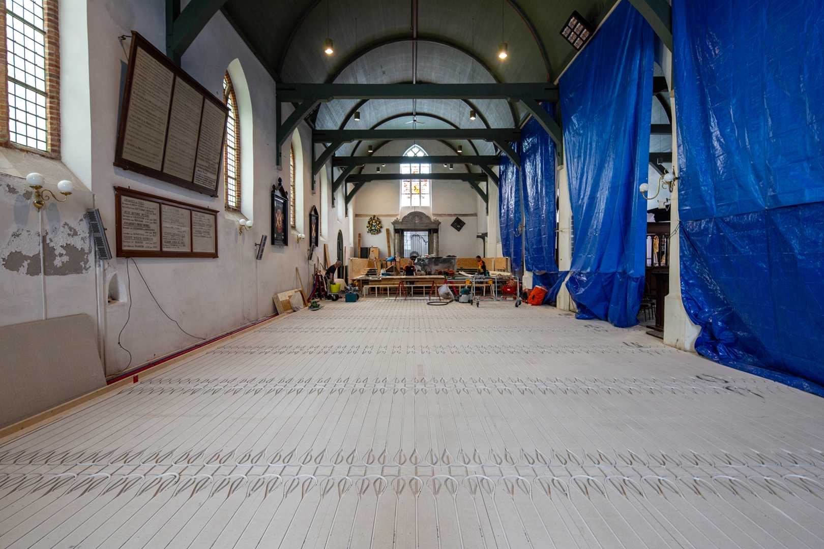Innovatieve klimaatoplossing in historisch jasje: demontabele vloerverwarming voor Grote Kerk Beverwijk
