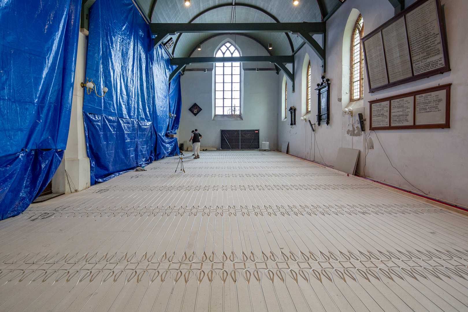 Innovatieve klimaatoplossing in historisch jasje: demontabele vloerverwarming voor Grote Kerk Beverwijk